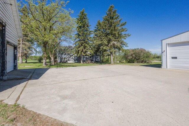 35445 County Highway 36, Vergas, MN 56587 - view of patio / terrace with a garage