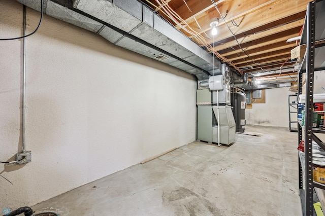 2318 15th St S Unit C11, Fargo, ND 58103 - unfinished below grade area featuring electric water heater