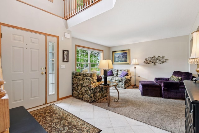2715 Autumn Woods Dr, Chaska, MN 55318 - living area with light tile patterned floors, light colored carpet, and baseboards