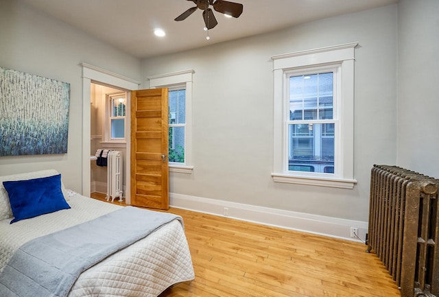 4448 Aldrich Ave S, Minneapolis, MN 55419 - bedroom with radiator, wood-type flooring, recessed lighting, and ceiling fan