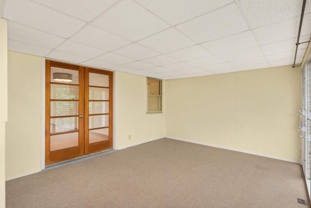 2479 Oxford St N, Roseville, MN 55113 - carpeted empty room with french doors and a drop ceiling