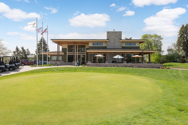 2479 Oxford St N, Roseville, MN 55113 - view of home's community with golf course view and a lawn