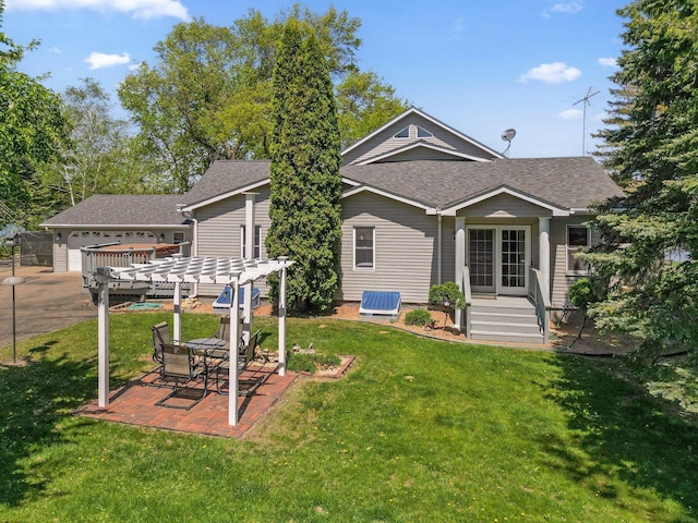 1823 313th Ave NE, Isanti Twp, MN 55008 - back of house with a pergola, roof with shingles, a yard, and a patio area