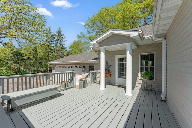 1823 313th Ave NE, Isanti Twp, MN 55008 - wooden terrace with an attached garage
