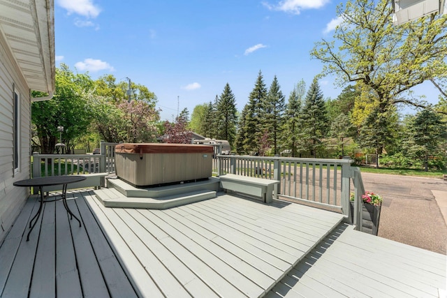 1823 313th Ave NE, Isanti Twp, MN 55008 - wooden deck with a hot tub