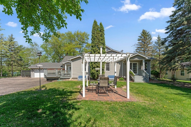 1823 313th Ave NE, Isanti Twp, MN 55008 - back of house with a pergola, a yard, and a garage