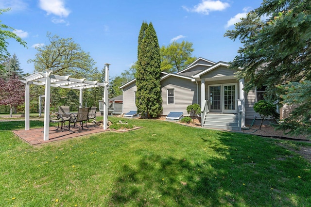 1823 313th Ave NE, Isanti Twp, MN 55008 - view of grassy yard with a pergola and a patio