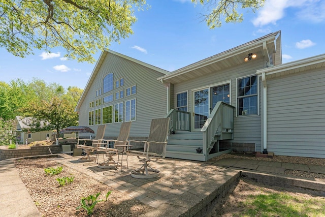 1823 313th Ave NE, Isanti Twp, MN 55008 - rear view of house featuring a patio