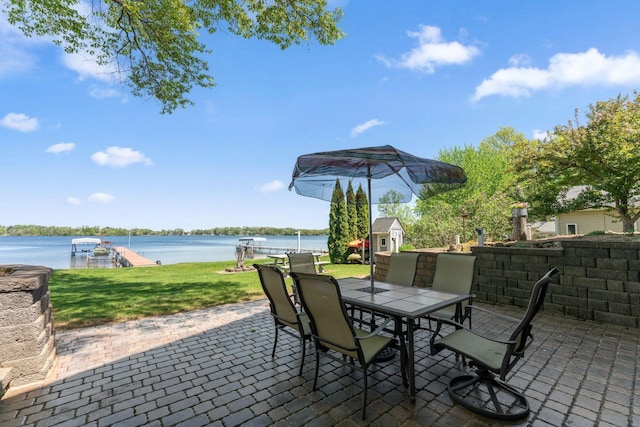 1823 313th Ave NE, Isanti Twp, MN 55008 - view of patio / terrace with outdoor dining space, a water view, and a boat dock