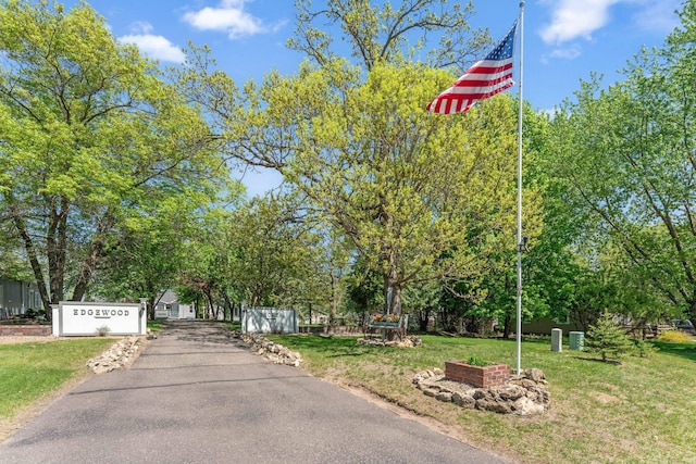 1823 313th Ave NE, Isanti Twp, MN 55008 - view of front of home with a front lawn and driveway