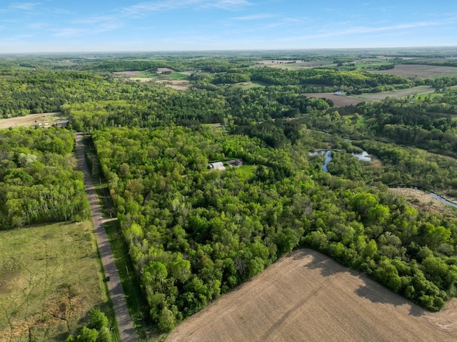 drone / aerial view of a heavily wooded area