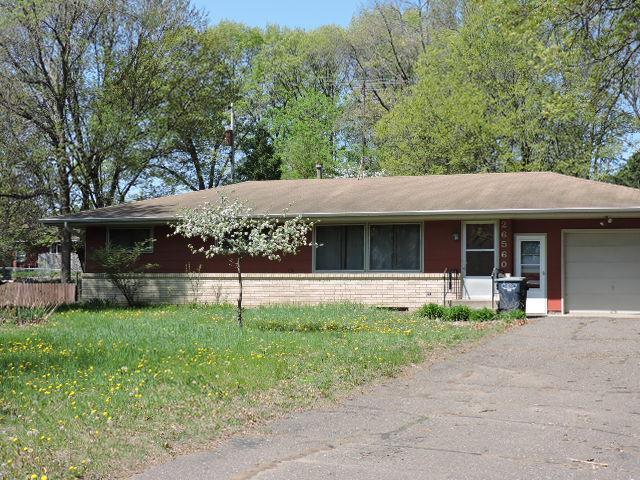 26560 Forli Ave, Wyoming, MN 55092 - ranch-style house featuring a garage, driveway, and brick siding