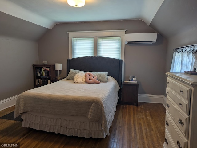 532 Main St S, Sauk Centre, MN 56378 - bedroom with lofted ceiling, an AC wall unit, baseboards, and dark wood finished floors