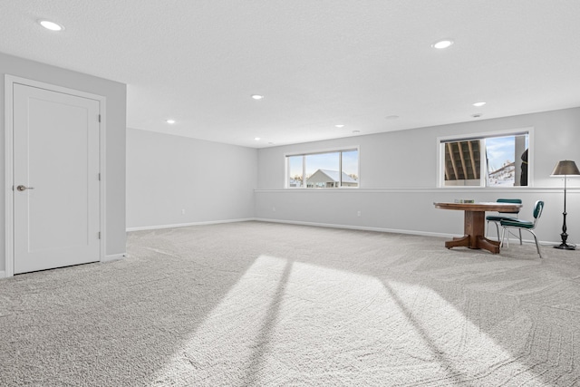 1501 Southpoint Dr, Hudson, WI 54016 - unfurnished living room featuring carpet flooring, baseboards, and recessed lighting