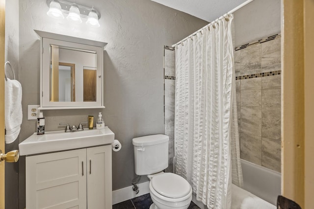 full bathroom featuring toilet, vanity, a textured wall, tile patterned floors, and shower / bath combination with curtain