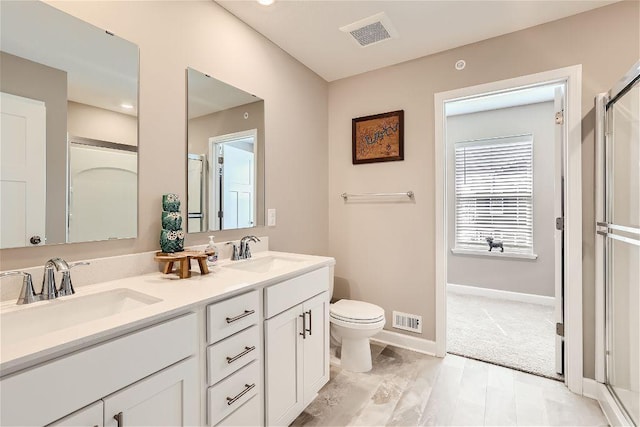 full bath with toilet, a shower with door, double vanity, baseboards, and recessed lighting
