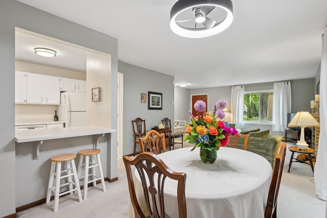 2250 Ridge Dr Unit 11, Saint Louis Park, MN 55416 - dining space featuring light colored carpet and baseboards