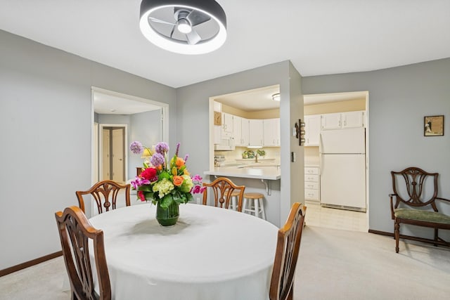 2250 Ridge Dr Unit 11, Saint Louis Park, MN 55416 - dining space with light carpet and baseboards