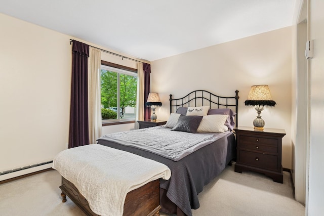 2250 Ridge Dr Unit 11, Saint Louis Park, MN 55416 - bedroom featuring light colored carpet and baseboard heating