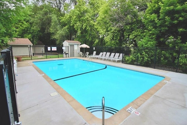 2250 Ridge Dr Unit 11, Saint Louis Park, MN 55416 - community pool featuring fence, view of scattered trees, and a patio