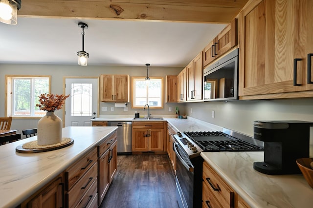 28257 French Rd, Danbury, WI 54830 - kitchen featuring appliances with stainless steel finishes, plenty of natural light, dark wood-style floors, and a sink