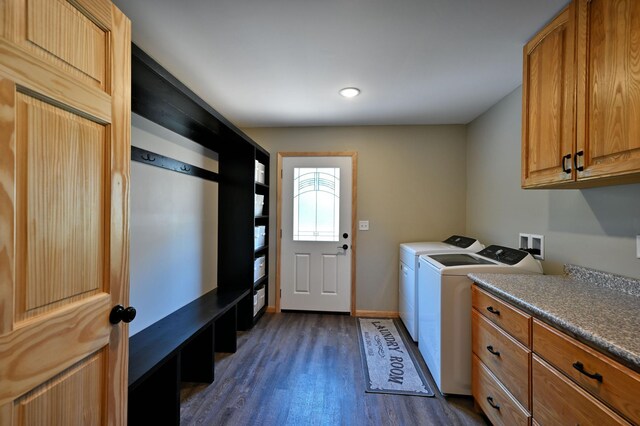 28257 French Rd, Danbury, WI 54830 - clothes washing area with dark wood-type flooring, washing machine and clothes dryer, cabinet space, recessed lighting, and baseboards