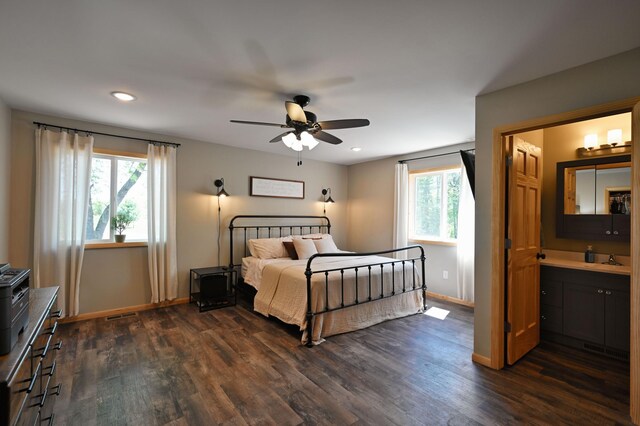 28257 French Rd, Danbury, WI 54830 - bedroom featuring dark wood finished floors, baseboards, recessed lighting, and a ceiling fan