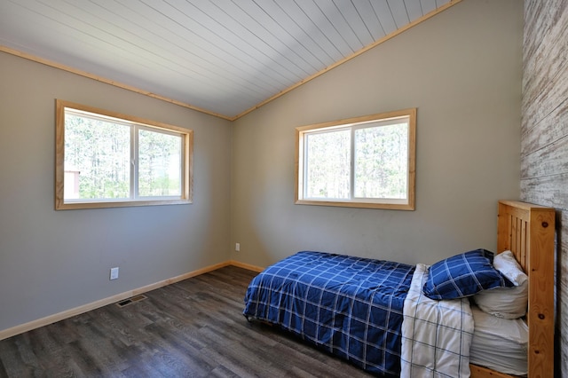 28257 French Rd, Danbury, WI 54830 - bedroom featuring lofted ceiling, multiple windows, wood finished floors, wooden ceiling, and baseboards