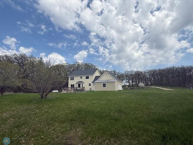 24129 County Road 144, Detroit Twp, MN 56501 - view of property exterior featuring a yard