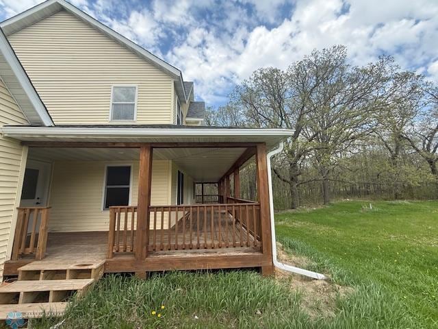 24129 County Road 144, Detroit Twp, MN 56501 - exterior space with a lawn and covered porch