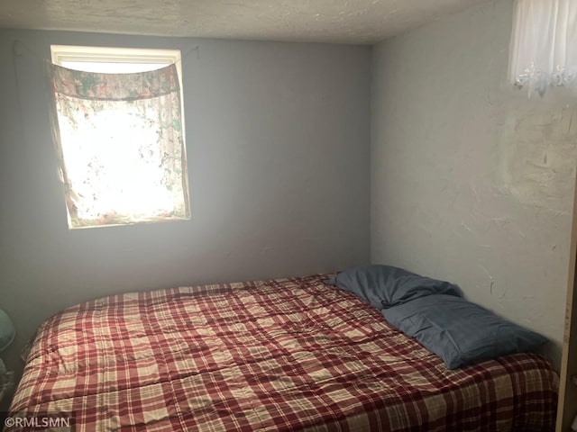 bedroom with a textured ceiling