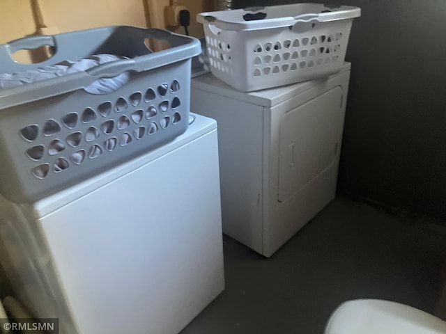 laundry area featuring separate washer and dryer