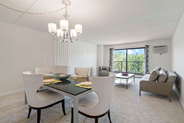 dining area with light carpet, a chandelier, a wall mounted air conditioner, and baseboards
