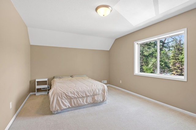 23141 Hilo Ave N, Forest Lake, MN 55025 - carpeted bedroom with lofted ceiling and baseboards