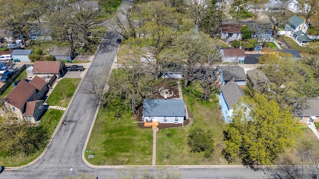 aerial view of property's location with nearby suburban area