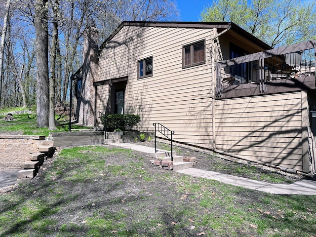 109 Eagle Lake Dr, Maple Grove, MN 55369 - view of side of property featuring a chimney
