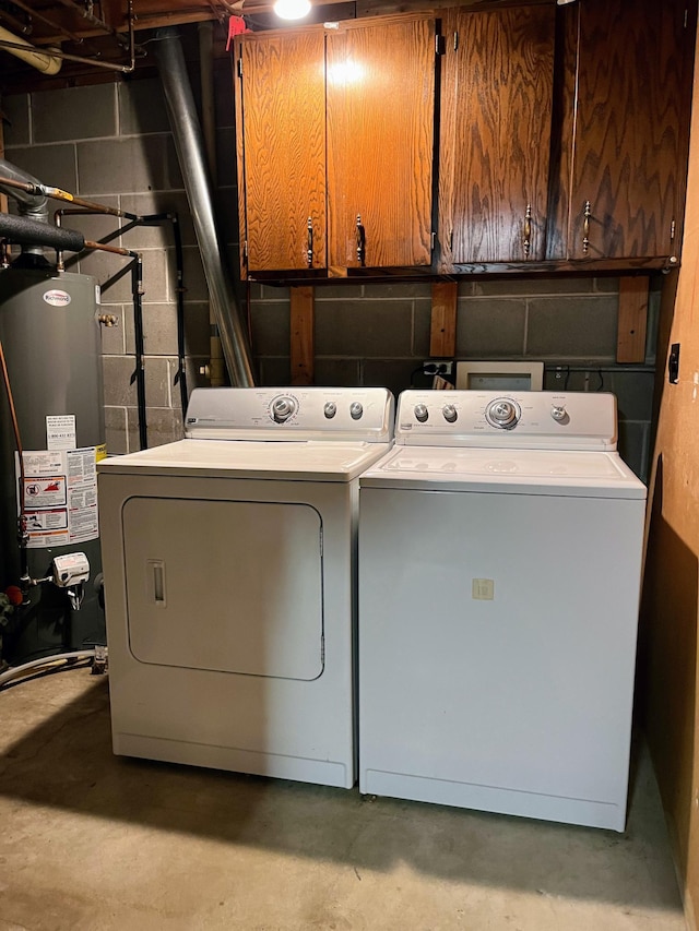 109 Eagle Lake Dr, Maple Grove, MN 55369 - washroom featuring gas water heater, washer and clothes dryer, and concrete block wall