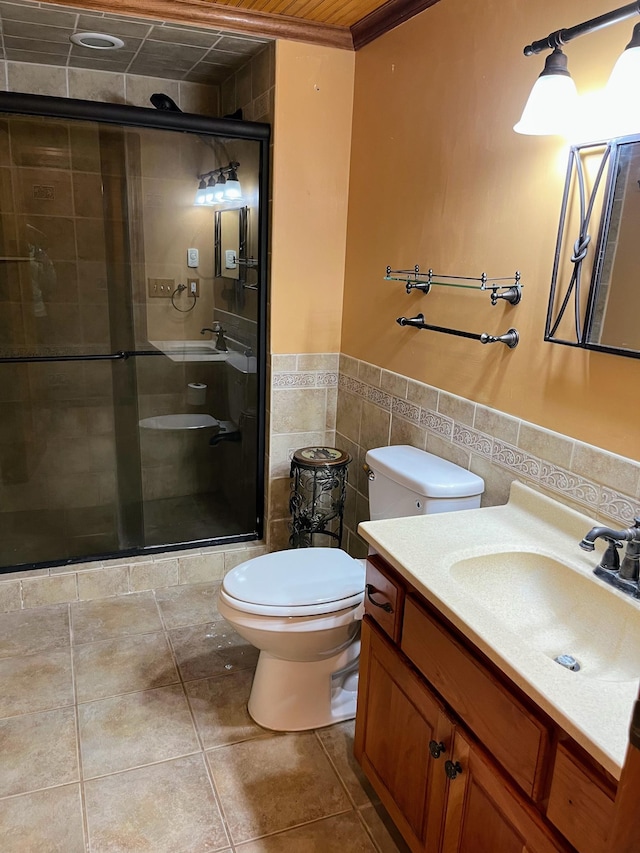 109 Eagle Lake Dr, Maple Grove, MN 55369 - full bathroom with tile walls, a stall shower, toilet, vanity, and tile patterned flooring