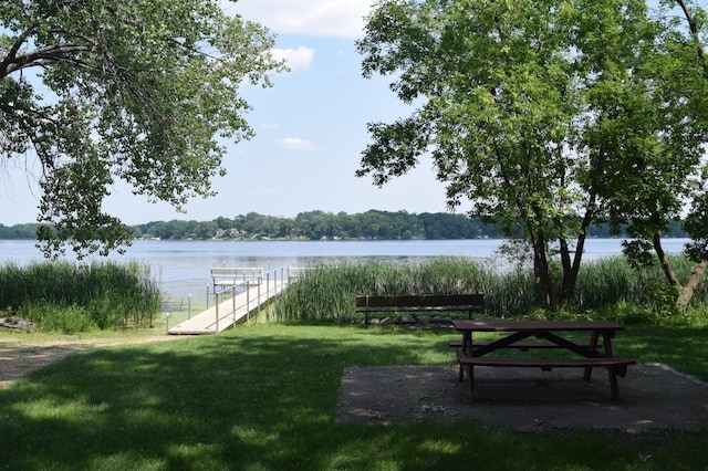 109 Eagle Lake Dr, Maple Grove, MN 55369 - view of home's community featuring a water view, a dock, and a lawn