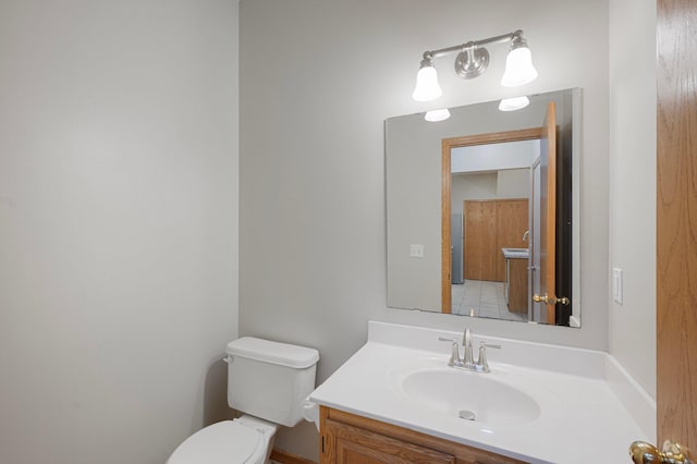 8497 Cortland Rd, Eden Prairie, MN 55344 - bathroom featuring toilet and vanity