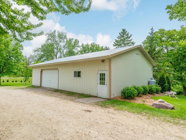71156 Csah 18, Collinwood Twp, MN 55325 - garage with dirt driveway