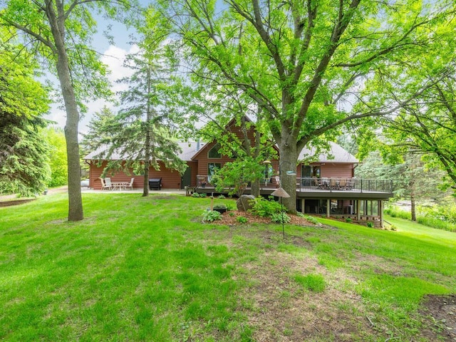 71156 Csah 18, Collinwood Twp, MN 55325 - view of grassy yard with a deck