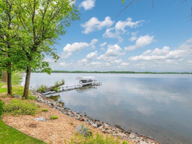 71156 Csah 18, Collinwood Twp, MN 55325 - dock area with a water view and boat lift