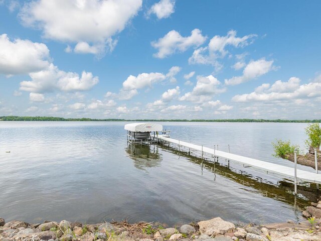 71156 Csah 18, Collinwood Twp, MN 55325 - dock area featuring a water view and boat lift