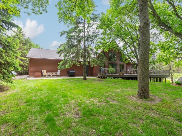 71156 Csah 18, Collinwood Twp, MN 55325 - view of grassy yard featuring a patio and a deck