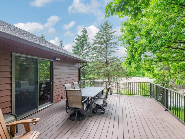 71156 Csah 18, Collinwood Twp, MN 55325 - wooden deck featuring outdoor dining space