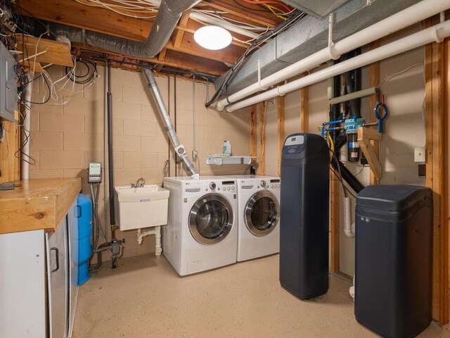 71156 Csah 18, Collinwood Twp, MN 55325 - washroom featuring independent washer and dryer and concrete block wall