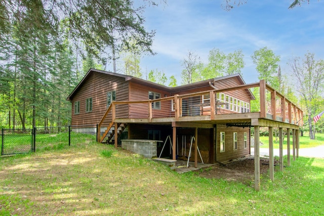 51850 Scenic Hwy Unit 7, Bigfork, MN 56628 - rear view of house with a gate, a deck, and stairs