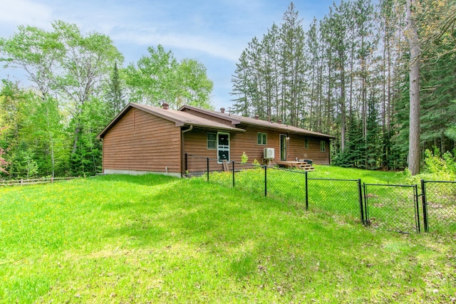51850 Scenic Hwy Unit 7, Bigfork, MN 56628 - rear view of property with a gate and a chimney