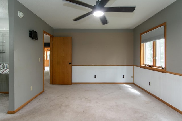 51850 Scenic Hwy Unit 7, Bigfork, MN 56628 - carpeted empty room with ceiling fan, baseboards, and a smoke detector